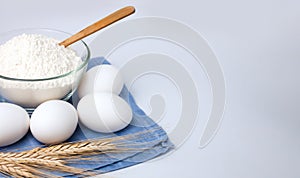 Ingredients for dough: flour and eggs. Cooking process. Close-up. Copy space