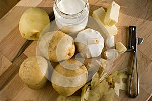 Ingredients for garlic mashed potatoes in late afternoon light