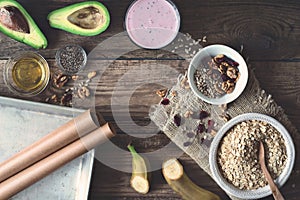 Ingredients for healthy breakfast on the wooden table top view