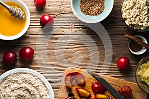 Ingredients for healthy breakfast on the wooden table top view