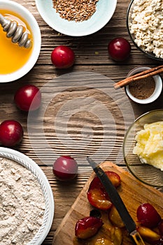 Ingredients for healthy breakfast on the wooden table vertical