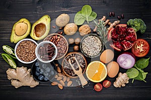 Ingredients for the healthy foods selection. The concept of healthy food set up on wooden background