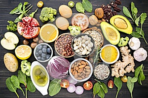 Ingredients for the healthy foods selection. The concept of healthy food set up on wooden background