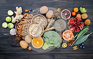 Ingredients for the healthy foods selection. The concept of healthy food set up on wooden background