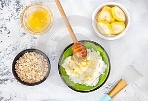 Ingredients for homemade scrub banana, honey, oatmeal coconut oil. Beauty Concept