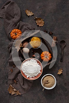 Ingredients for Homemade sweet pumpkin cinnabons, buns with cinnamon