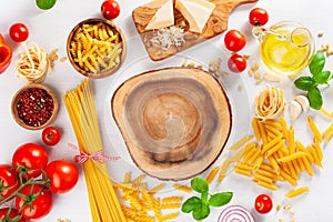 Ingredients for italian cousine flat lay, pasta spaghetti penne fusilli tomato oil vegetables