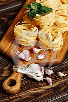 Ingredients for Italian Pasta on wooden table