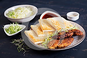 Ingredients for Katsu Sando - food trend japanese sandwich with breaded pork chop photo