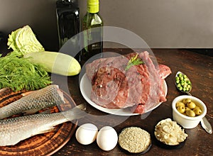 Ingredients of the keto diet are green vegetables, meat products. Healthy background. Ketogenic protein and carbohydrate foods