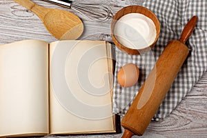 Ingredients and kitchen tools with the old blan