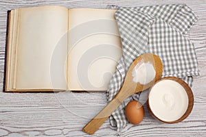 Ingredients and kitchen tools with the old blan