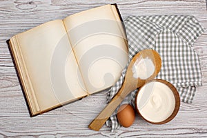 Ingredients and kitchen tools with the old blan