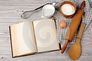 Ingredients and kitchen tools with the old blan