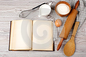 Ingredients and kitchen tools with the old blan photo