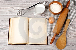 Ingredients and kitchen tools with the old blan