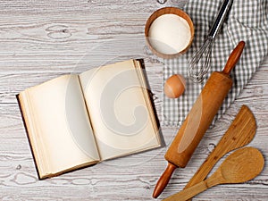 Ingredients and kitchen tools with the old blan