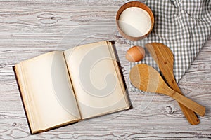 Ingredients and kitchen tools with the old blan