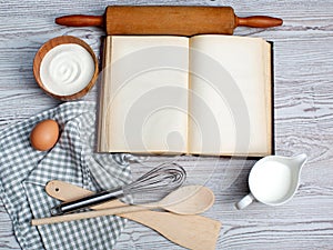 Ingredients and kitchen tools with the old blan