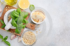 Ingredients for making green pesto sauce.