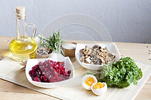 Ingredients for making salad with beets and walnut