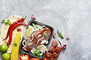 Ingredients for making tacos. Mexican food. Corn tortilla with beef and vegetables