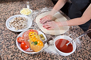 Ingredients For Making Vegetarian Pizza - Dough, Peppers, Tomatoes, Mushrooms, Ketchup, Olives And Cheese