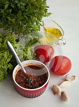 Ingredients for Marinara sauce on white background