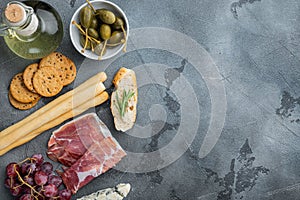 Ingredients for mediterranean food, meat cheede, herbs, on gray background, flat lay  with copy space for text