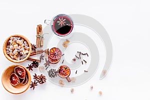 Ingredients mulled wine or grog with spices and citrus for winter evening. Christmas new year eve. White background top