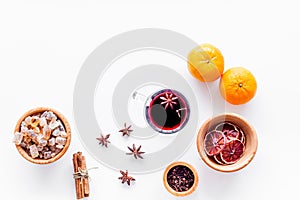 Ingredients mulled wine or grog with spices and citrus for winter evening. Christmas new year eve. White background top