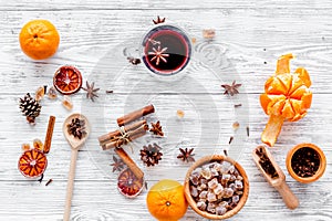 Ingredients mulled wine or grog with spices and citrus for winter evening. Christmas new year eve. Wooden background top