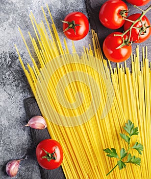 Ingredients for pasta, carbonara  bolognese on platte. Spaghetti, tomate, spices photo