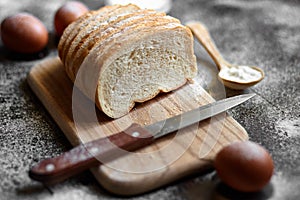 Bread, flour, eggs and cherry tomatoes.