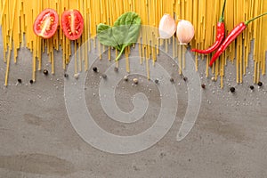 Ingredients spaghetti on the stone background