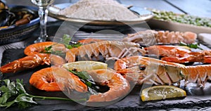 Ingredients for a Spanish seafood paella: mussels, king prawns, langoustine, haddock
