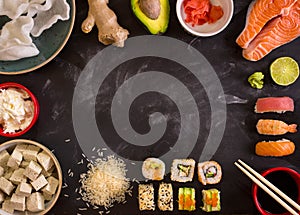 Ingredients for sushi on dark background