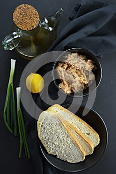 Ingredients to make greek fish roe dip on black background