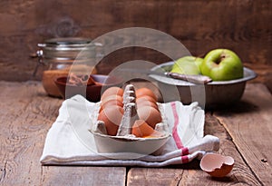 Ingredients and tools for making an apple pie, top view