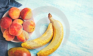 Ingredients for a tropical fruit smoothie with mango and banana