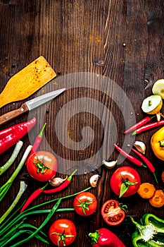 ingredients for vegetable ragout on wooden background top view