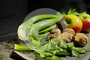 Ingredients for Waldorf salad - celery, apples, walnotes - fres