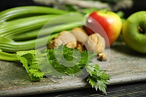 Ingredients for Waldorf salad - celery, apples, walnotes - fres