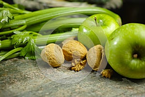 Ingredients for Waldorf salad - celery, apples, walnotes - fres