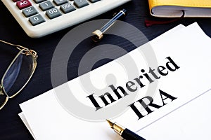 Inherited IRA documents on a table. Retirement plan