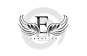 Initial E Typography Flourishes Logogram Beauty Wings Logo photo