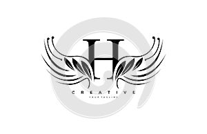 Initial H Typography Flourishes Logogram Beauty Wings Logo photo