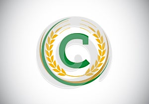 Initial letter C sign symbol with wheat ears wreath. Organic wheat farming logo design concept. Agriculture logo design vector