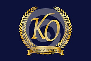 Initial letter K and O, KO monogram logo design with laurel wreath. Luxury golden calligraphy font