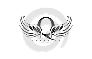 Initial Q Typography Flourishes Logogram Beauty Wings Logo photo